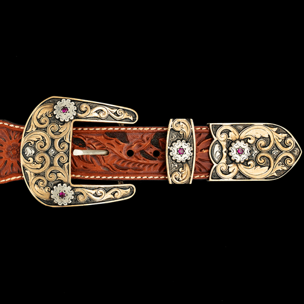 The timeless El Dorado Custom Three Piece Buckle Set is the picture of Western class. Features intrincate bronze scrollwork and and custom stones color. Pair it with a discount belt and keychain!